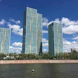 https://grand-alatau-naberezhnaya-a-class-apartment.hotels-in-astana.com